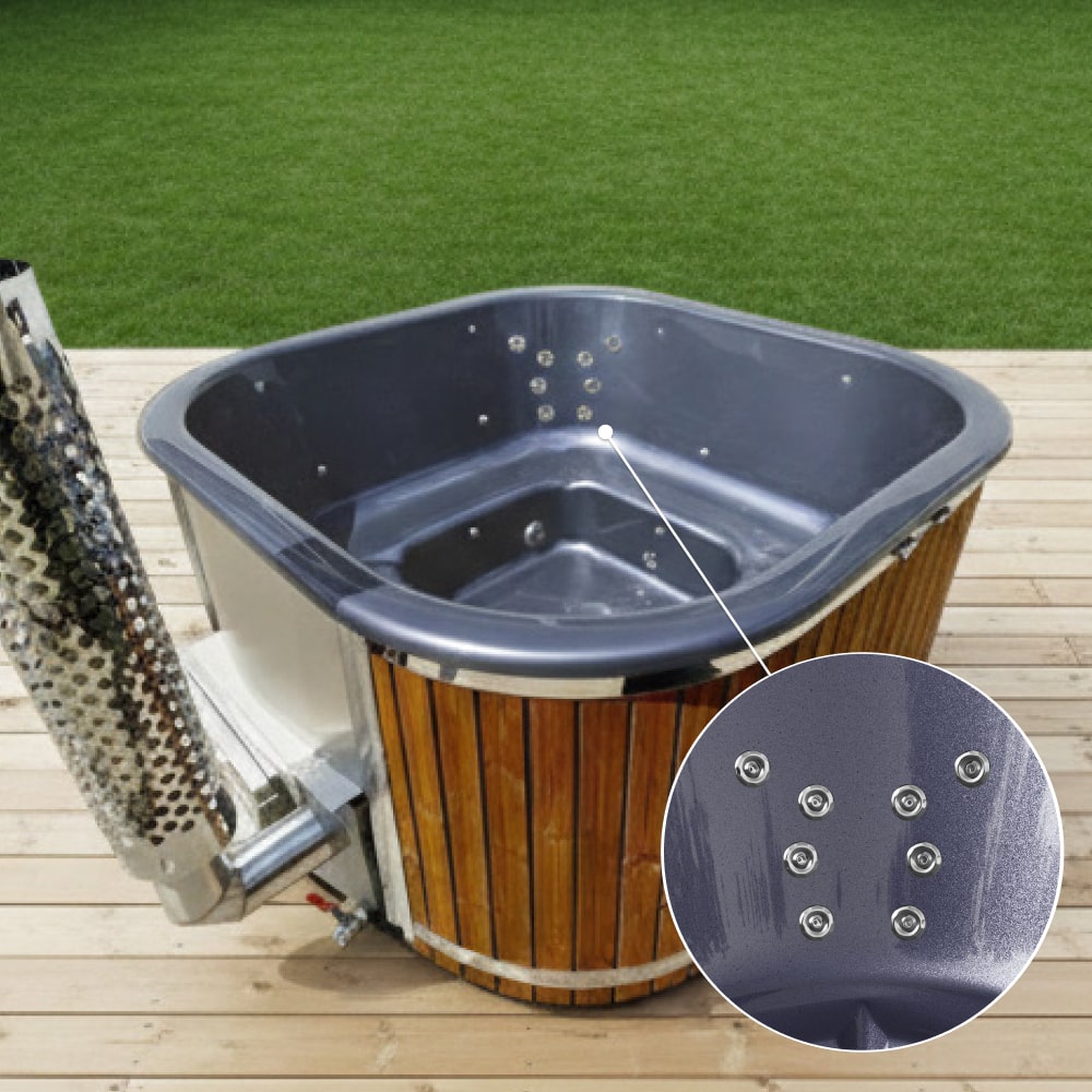 Outdoor view of wood fired hot tub with metal chimney, wooden exterior, and multiple hydro jets inside tub seating area
