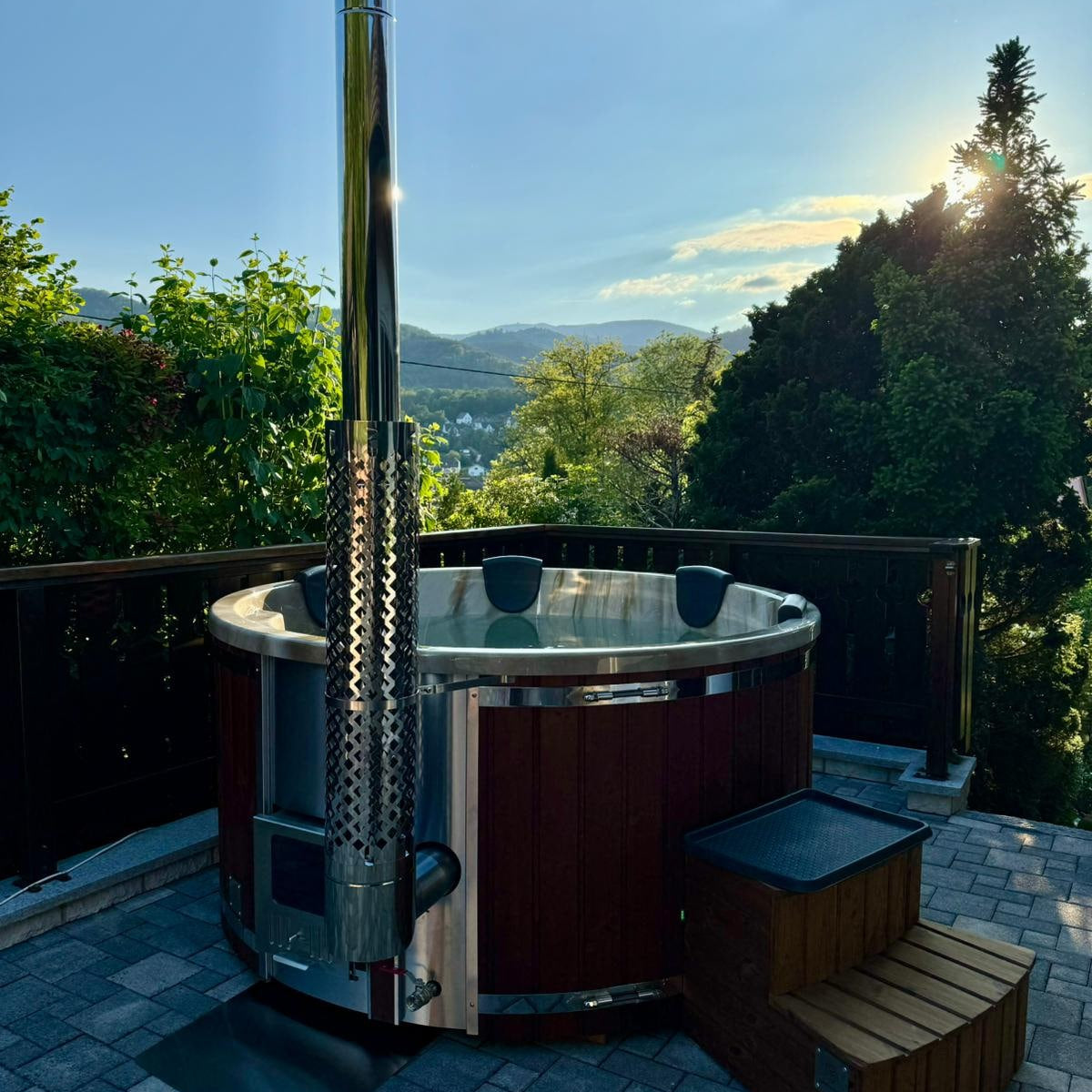Modern Gardenvity hot tub setup with mountain view in France.