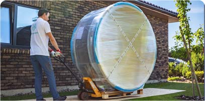 Wood-fired hot tub wrapped and prepared for delivery to customer location