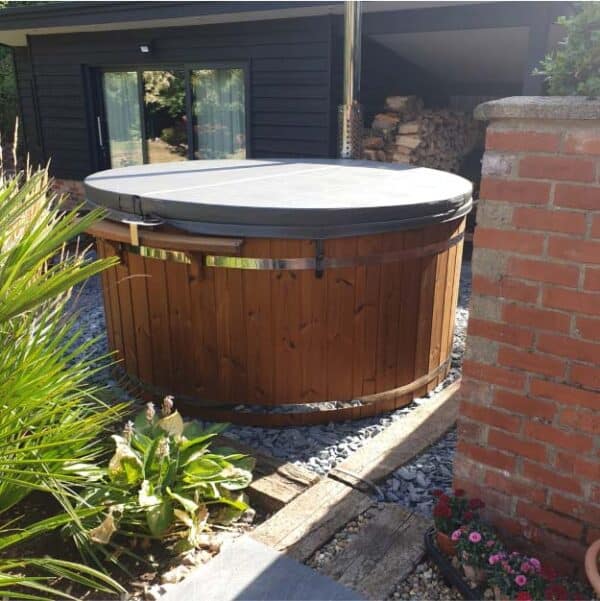 Customer's photo with a Gardenvity wood-fired hot tub that heats very fast