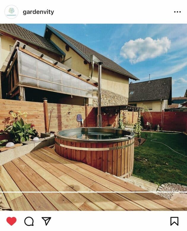 A Gardenvity wood-fired hot tub fitted perfectly in a family's backyard