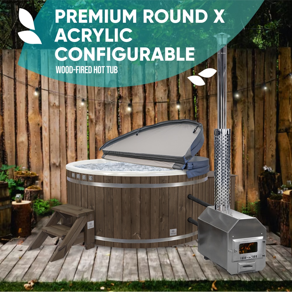 A round Gardenvity wood-fired hot tub placed in a private garden